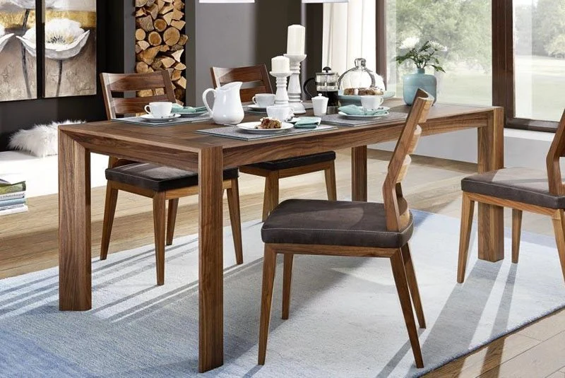 The timber dining table from the Stallion Dining design catalog